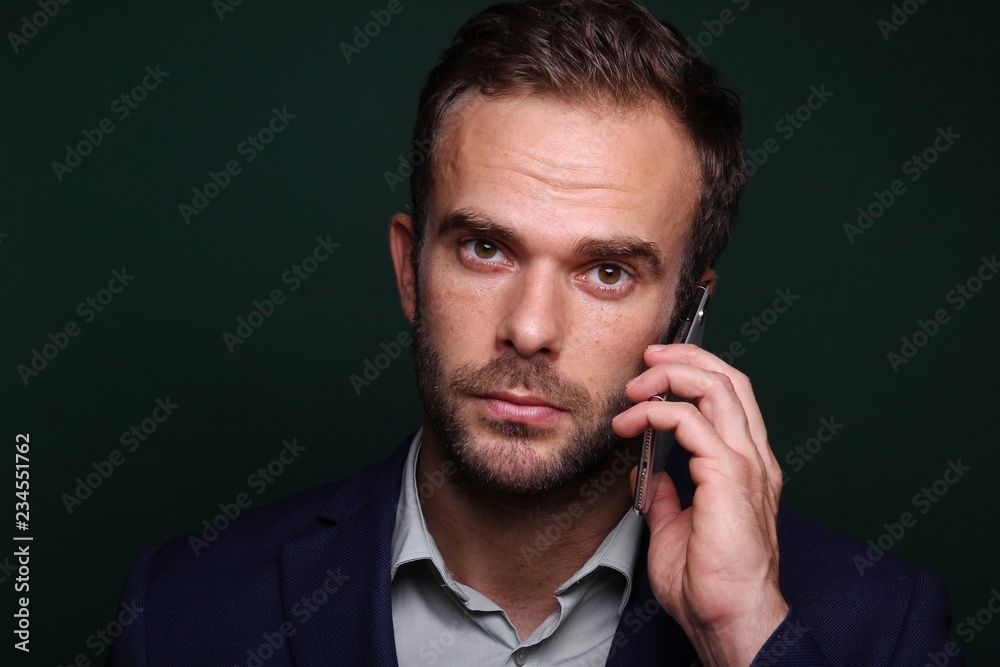 Young man in front of a colored background Young man in front of a colored background