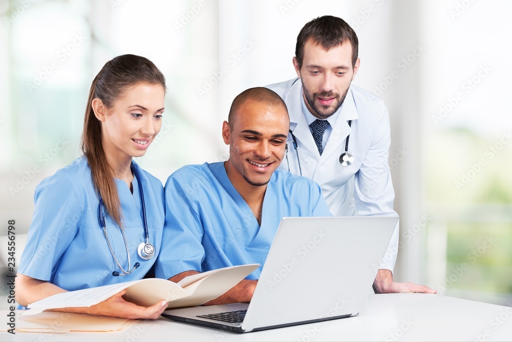 Doctors team talking expertise in hospital