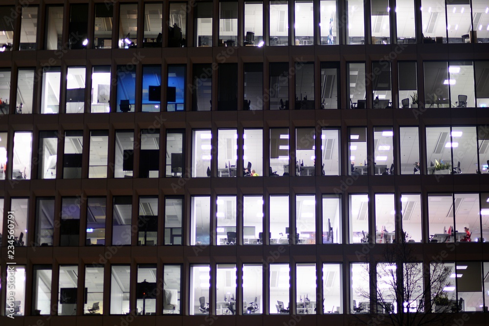 Modern office building at night. Night lights, city office building downtown, cityscape view