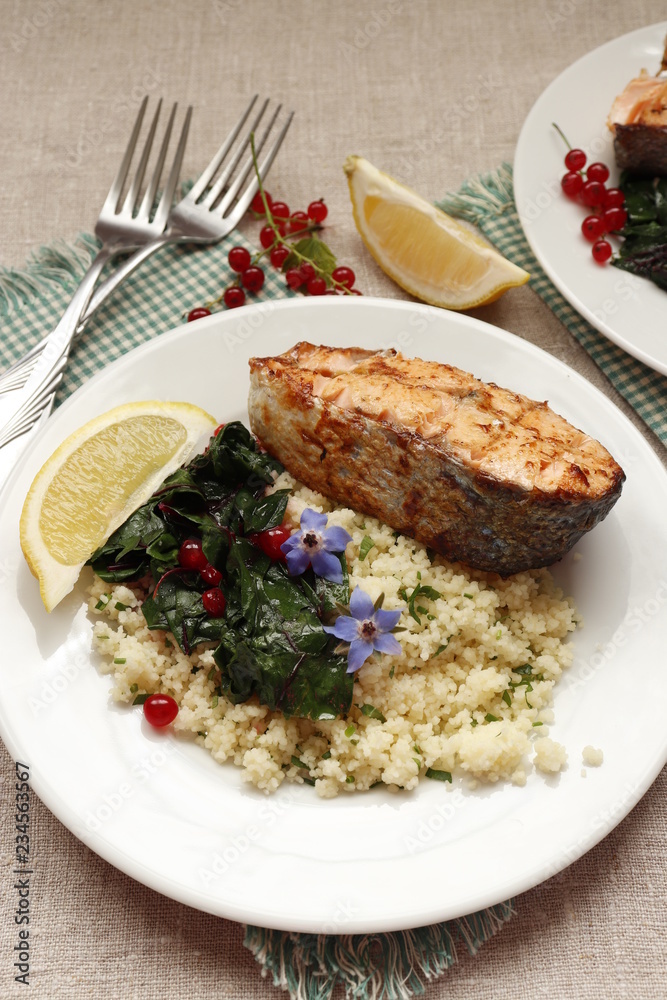 Grilled salmon with couscous, braised chard and red currants. Grilled salmon with couscous, braised chard and red currants.