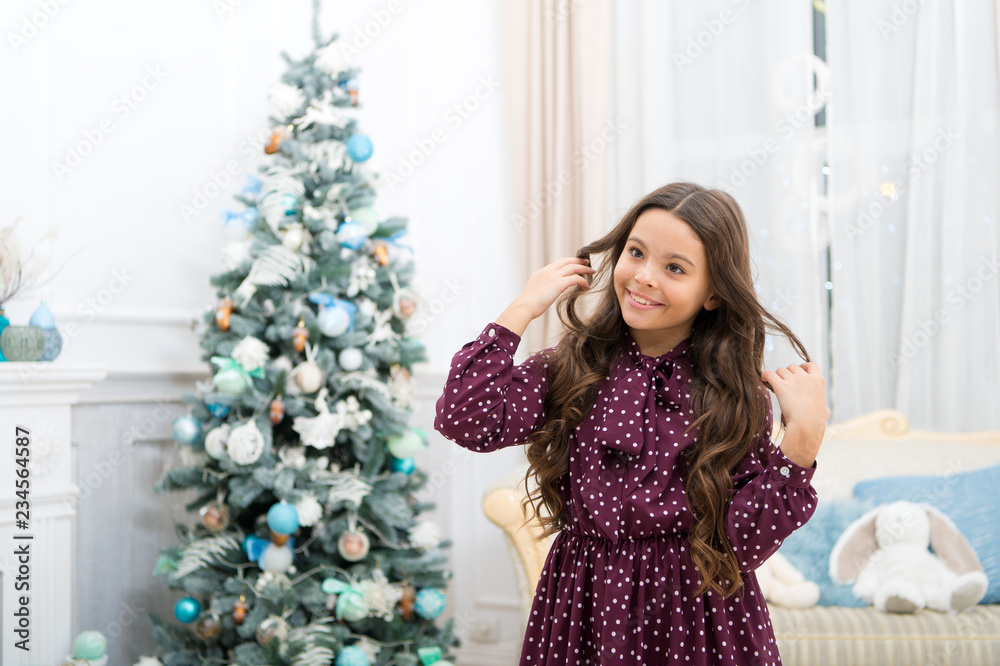 Cute little child girl with xmas present. The morning before Xmas. christmas family holiday. happy new year. Christmas shopping. waiting for santa. Winter. Watching Christmas shows together Cute little child girl with xmas present. The morning before Xmas. christmas family holiday. happy new year. Christmas shopping. waiting for santa. Winter. Watching Christmas shows together
