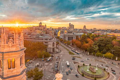 From the Cybele Palace the skyline of Madrid, Spain. View of the sunset in the Spanish capital city more tourist and visited of Europe with new and old buildings