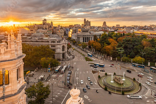 From the Cybele Palace the skyline of Madrid, Spain. View of the sunset in the Spanish capital city more tourist and visited of Europe with new and old buildings