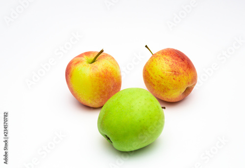 Group of ripe red apples isolated on white background. Green apples and apple cut with clipping path