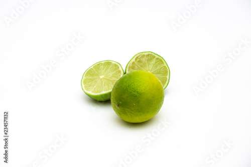 fresh green lime on white background