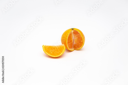 Ripe mandarin close-up on a white background. Tangerine orange on a white background.