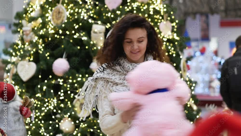 Young attractive female dancing with pig. Symbol of a year 2019. Year of a pig