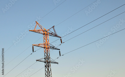 High-voltage power lines. Electricity distribution station. A pole with electrical wires.