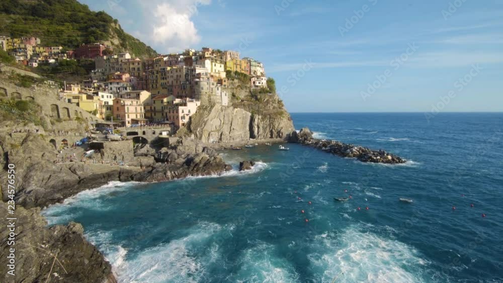 Manarola Village, Cinque Terre Coast of Italy. Manarola is a small town in the province of La Spezia, Liguria, northern Italy and one of the five Cinque terre attractions to tourist visiting Italy. Manarola Village, Cinque Terre Coast of Italy. Manarola is a small town in the province of La Spezia, Liguria, northern Italy and one of the five Cinque terre attractions to tourist visiting Italy.