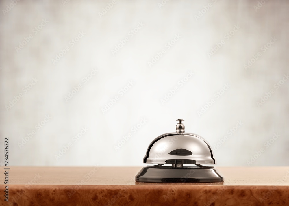 Vintage hotel reception service desk bell.