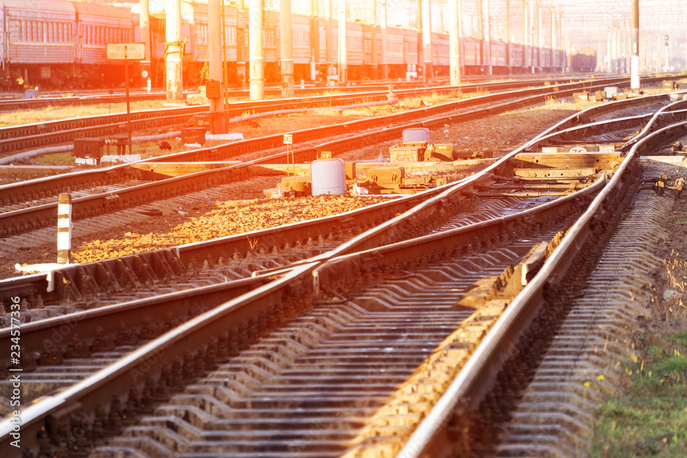 The concept of the railway with a gleam of sunlight, the area is covered with railway tracks, rest and travel