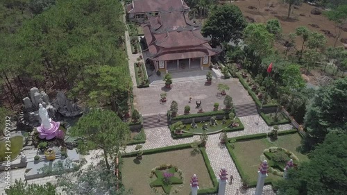 2K Aerial top view of an old asian temple in Bao Loc Vietnam among tea plantations. Zen buddhist temple in Vietnam. 