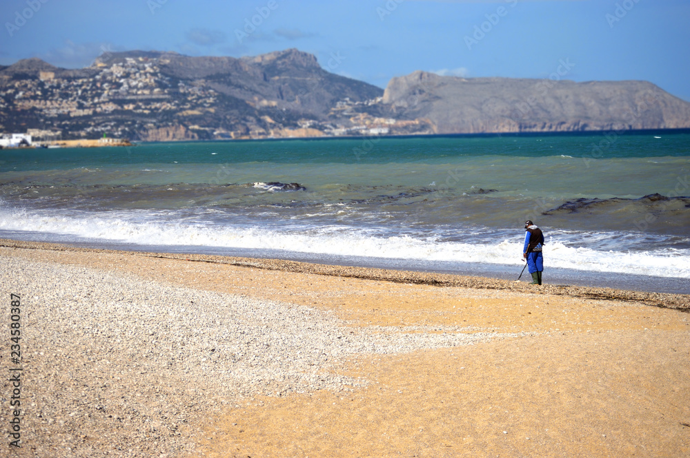 Treasure hunter at the Mediterranean coast