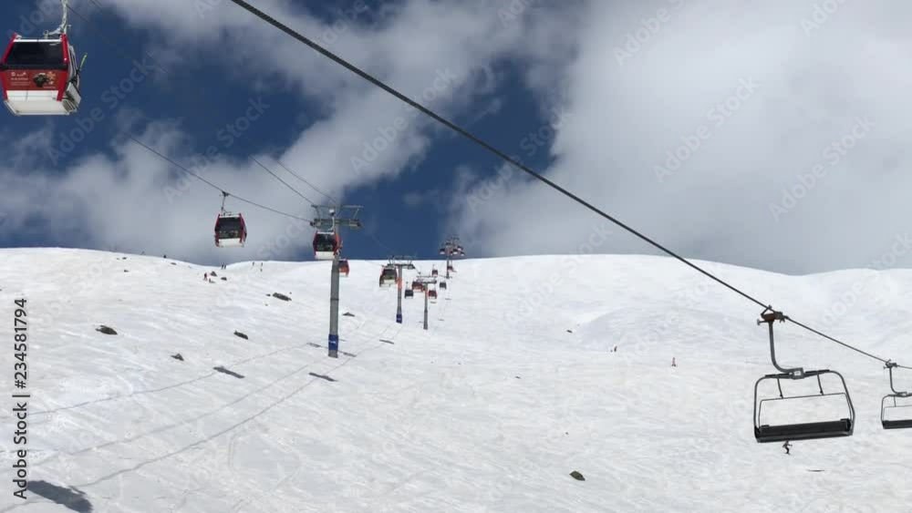sunny day winter time gudauri ski resort lift ride slow motion up view 4k georgia
sunny day winter time gudauri ski resort lift ride slow motion up view 4k georgia