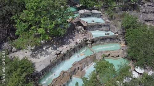2K Aerial view of thermal waterfalls at I-Resort, Nha Trang Vietnam. Natural waterfalls among trees