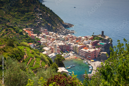 The stunning Cinque Terre town and harbour of Vernazza  as seen from the famous hiking trail