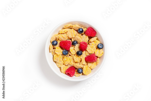 Photography bowl of multigrain cornflakes and berries