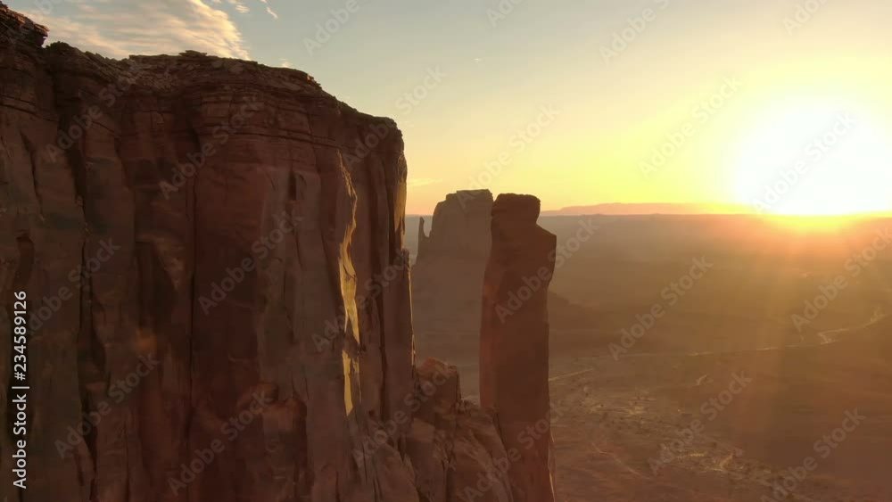 Monument Valley Sunrise West Mitten Butte Fly Over Aerial Telephoto Southwest USA