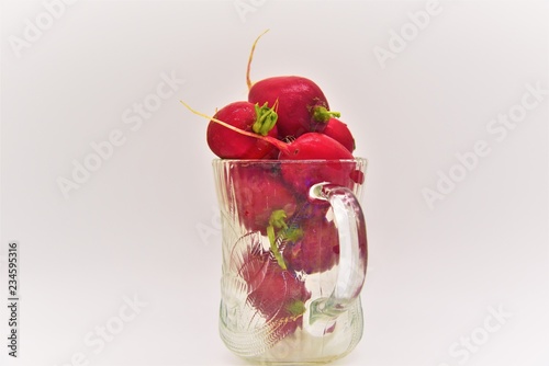 Red Radishes in Glass photo