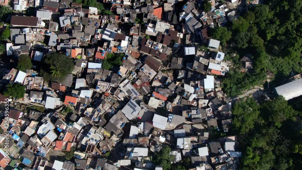 Aerial top view of crowded favela on the slopes of Corcovado mountain in Rio de Janeiro, Brazil.
