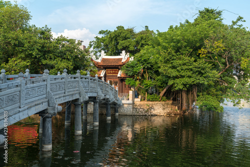 Thuy Trung Tien temple with stone bridge on Thanh Nien street in Hanoi, Vietnam