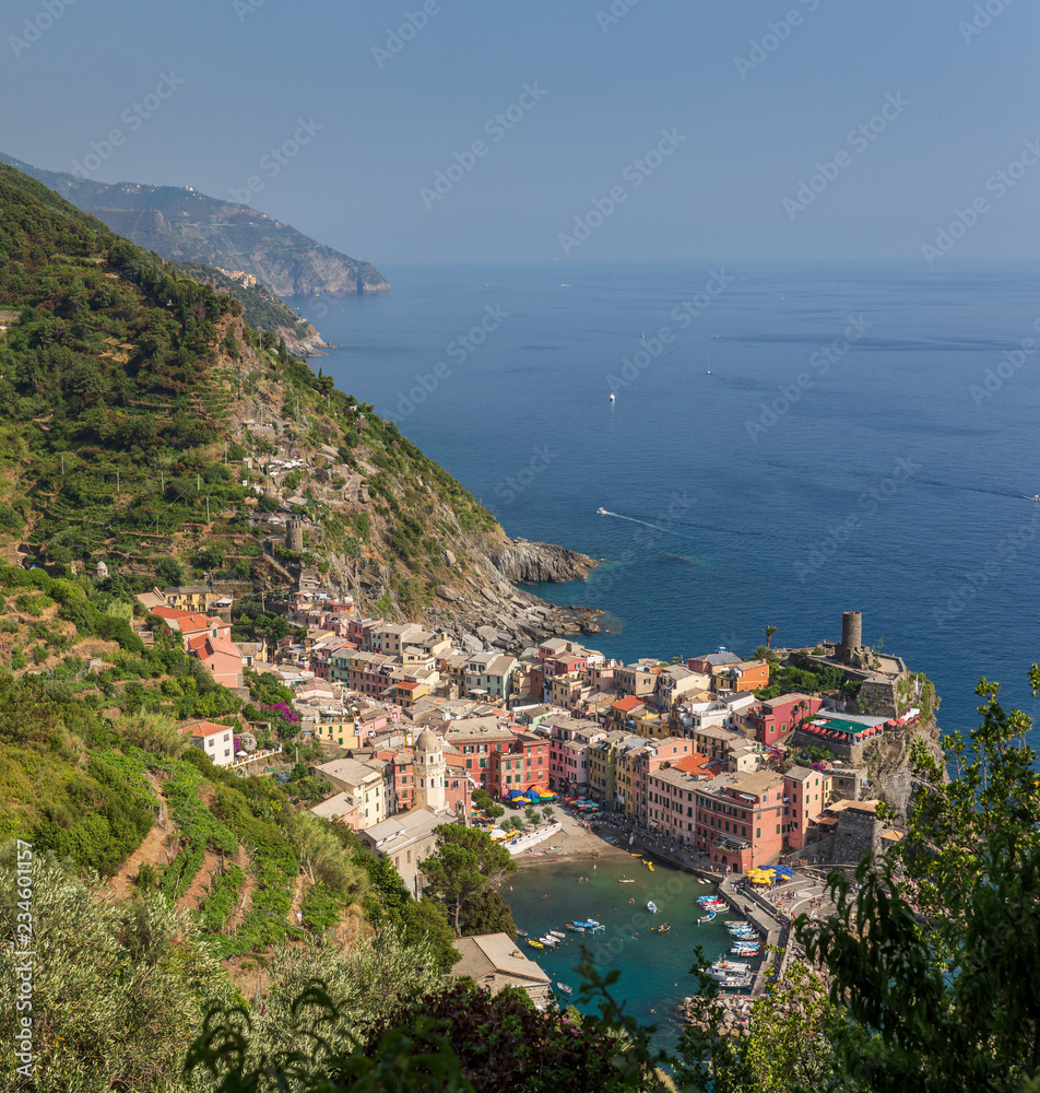 The stunning Cinque Terre town and harbour of Vernazza, as seen from the famous hiking trail