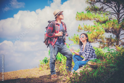 Male and female asian travel countryside. Travel relax. bag backpack travel.