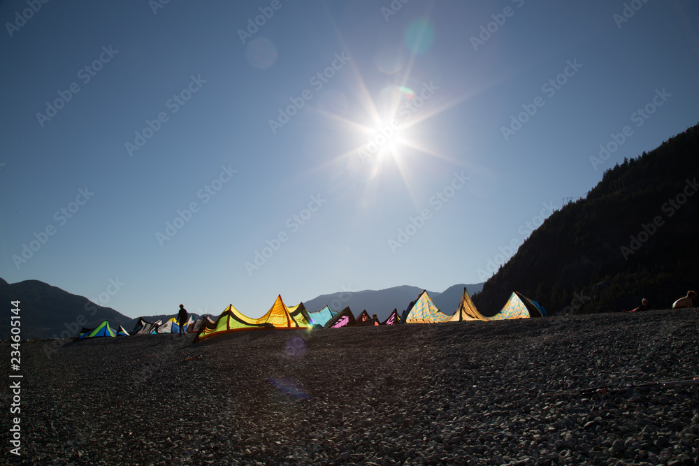 Kites surfers camping beach sunny day copy space 