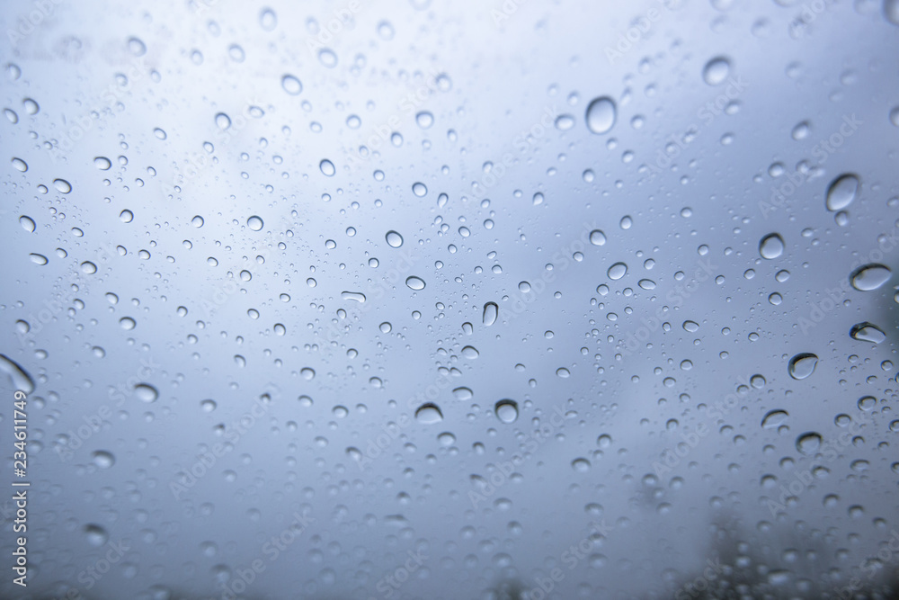 The background of rainwater drops on the glass, the waterless wallpaper on the white surface, is beautiful, according to the changes of the water. The background of rainwater drops on the glass, the waterless wallpaper on the white surface, is beautiful, according to the changes of the water.
