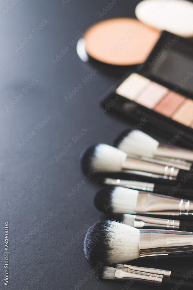 The makeup products. Brush and eyeshadow powder. The makeup products. Brush and eyeshadow powder.