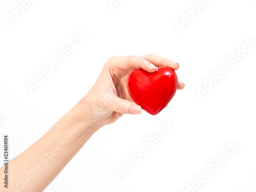 Hand holding red heart concept