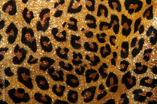 leopard texture of small sequins. bright beautiful background. glamour
