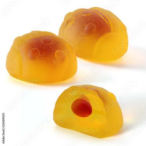 Yellow fruit gummy candy in the form of a beetle. Jelly Bean