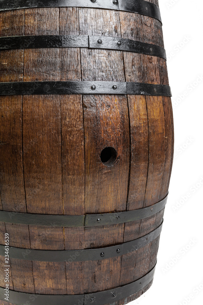 Obraz premium Wooden barrel with iron rings. Isolated on white background.