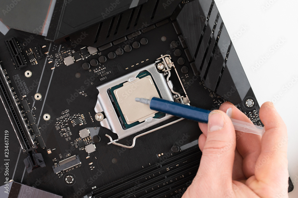 Top view of man hands puts cpu on motherboard, computer parts, Electronics  repair and upgrade on white desk background, copy space. Motherboard, processor  cpu, cooler, radiator, flat lay. Photos | Adobe Stock
