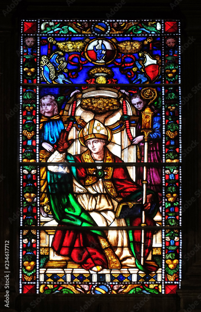 Stained glass window in the Santi Paolino e Donato church in Lucca, Tuscany, Italy 