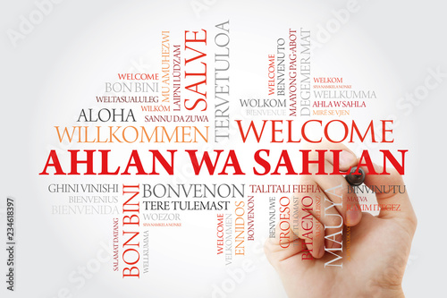 Ahlan Wa Sahlan (Welcome in Arabic) word cloud with marker in different languages, conceptual background photo