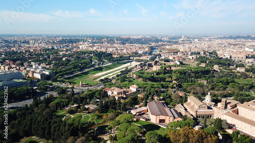 Aerial drone view from Roman Forum one of the main tourist attractions which was build in ancient times as the site of triumphal processions and elections next to Colosseum, Rome, Italy © aerial-drone