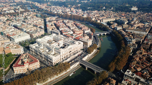 Aerial drone bird's eye panoramic view of iconic neoclassic building of Supreme Court of Cassation (Italian: Corte Suprema di Cassazione) next to famous Cavour square and river of Tiber, Rome, Italy