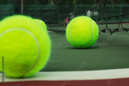 tennis ball in tennis court © taweesak