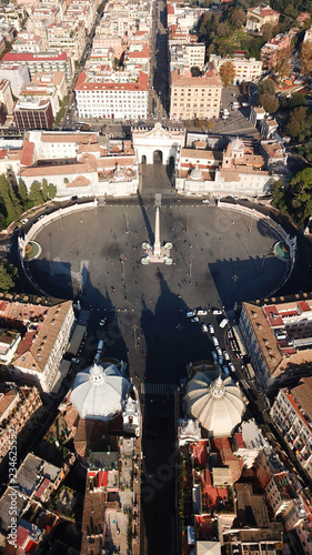 Aerial drone view of iconic Piazza del Popolo (People's Square) named after the church of Santa Maria del Popolo in the heart of Rome, Italy