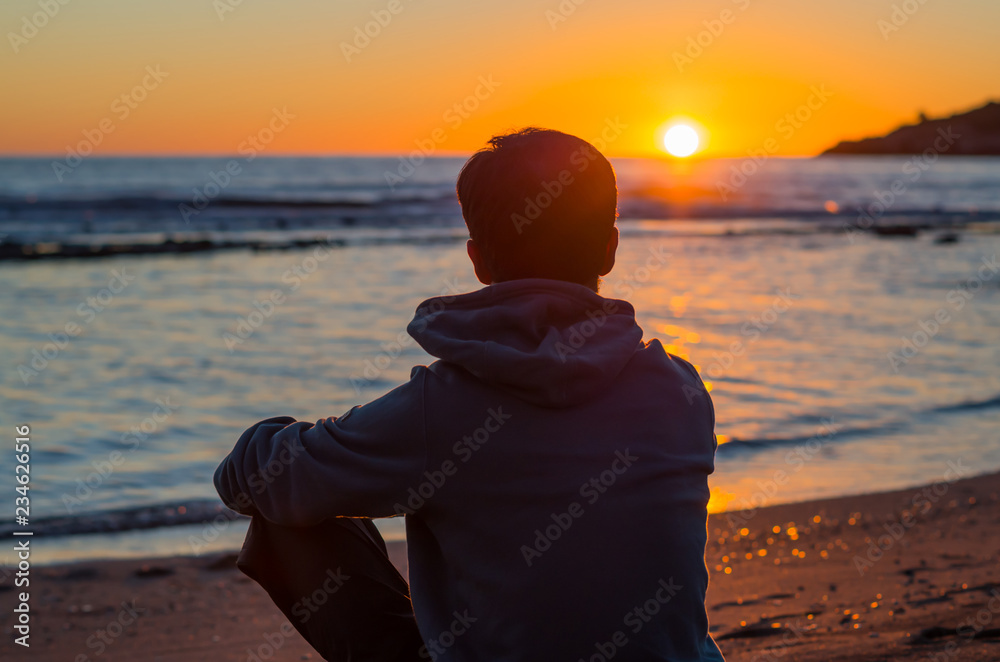 A Person Enjoying The Beach View of the Sunset · Free Stock Photo