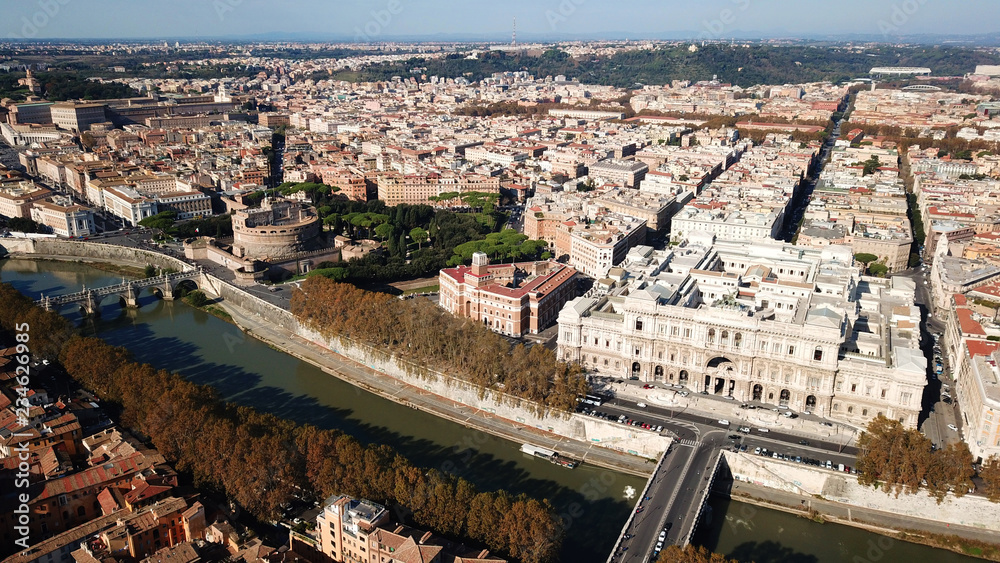 Aerial drone bird's eye panoramic view of iconic neoclassic building of Supreme Court of Cassation (Italian: Corte Suprema di Cassazione) next to famous Cavour square and river of Tiber, Rome, Italy