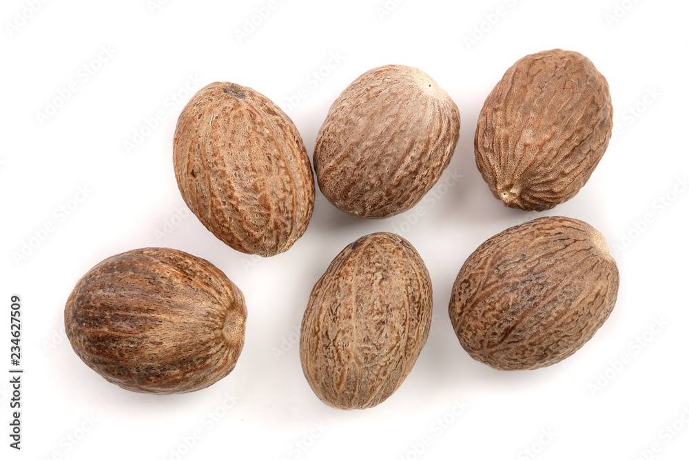Nutmeg isolated on white background. Top view Nutmeg isolated on white background. Top view