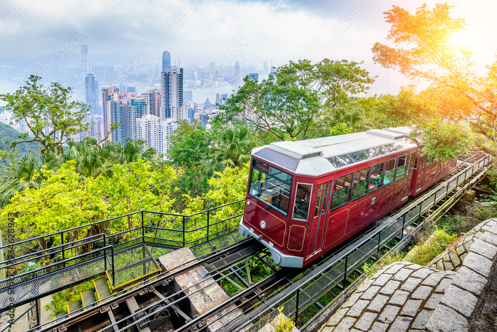View of Victoria Peak Tram in Hong Kong. - obrazy, fototapety, plakaty 