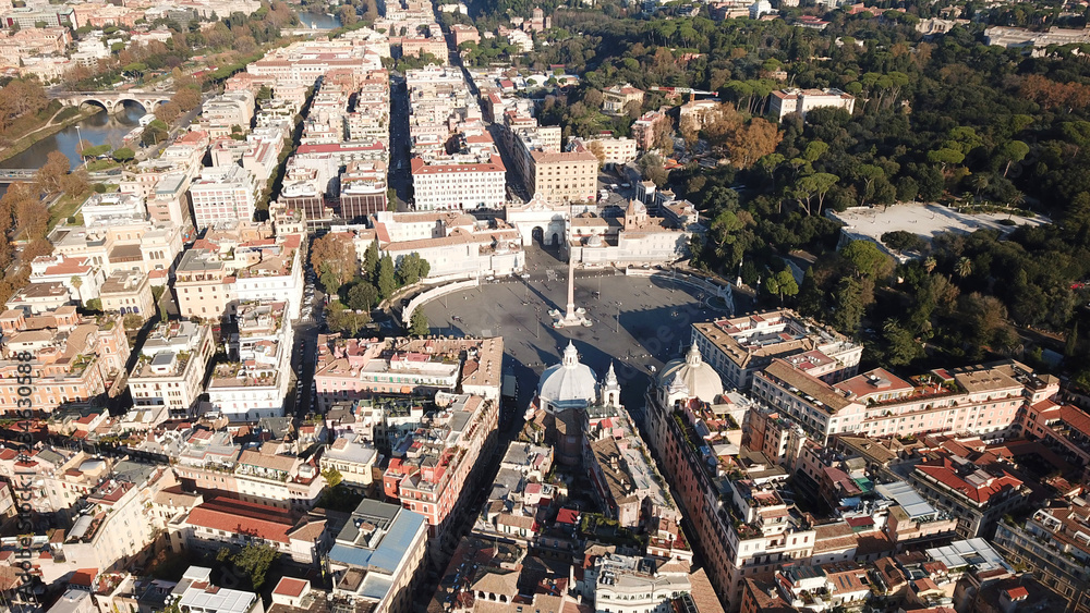 Aerial drone bird's eye view of iconic architecture in city of Rome next to river Tiber, Italy Aerial drone bird's eye view of iconic architecture in city of Rome next to river Tiber, Italy