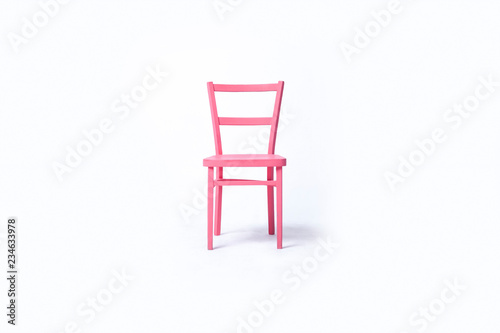 Pink chair on a white background