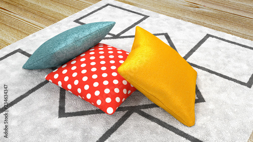 Kolorowe poduszki na dywanie