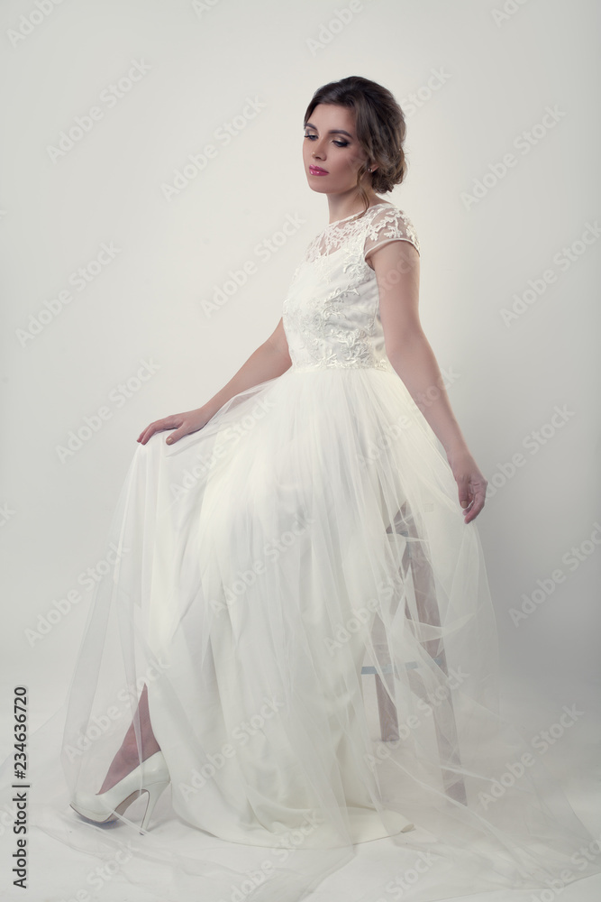Portrait of beautiful bride woman in white wedding dress Portrait of beautiful bride woman in white wedding dress