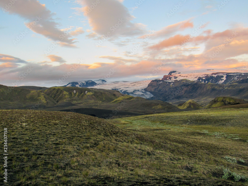 Stunning sunset with and Myrdalsjokull glacier, Katla caldera, Botnar-Ermstur, Laugavegur Trail, southern Iceland